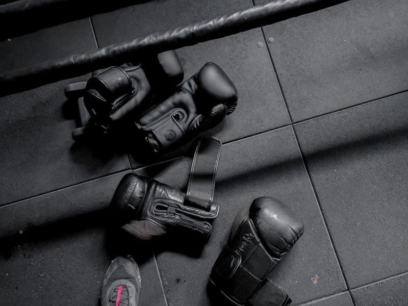 Athletic equipment on a dark wooden floor